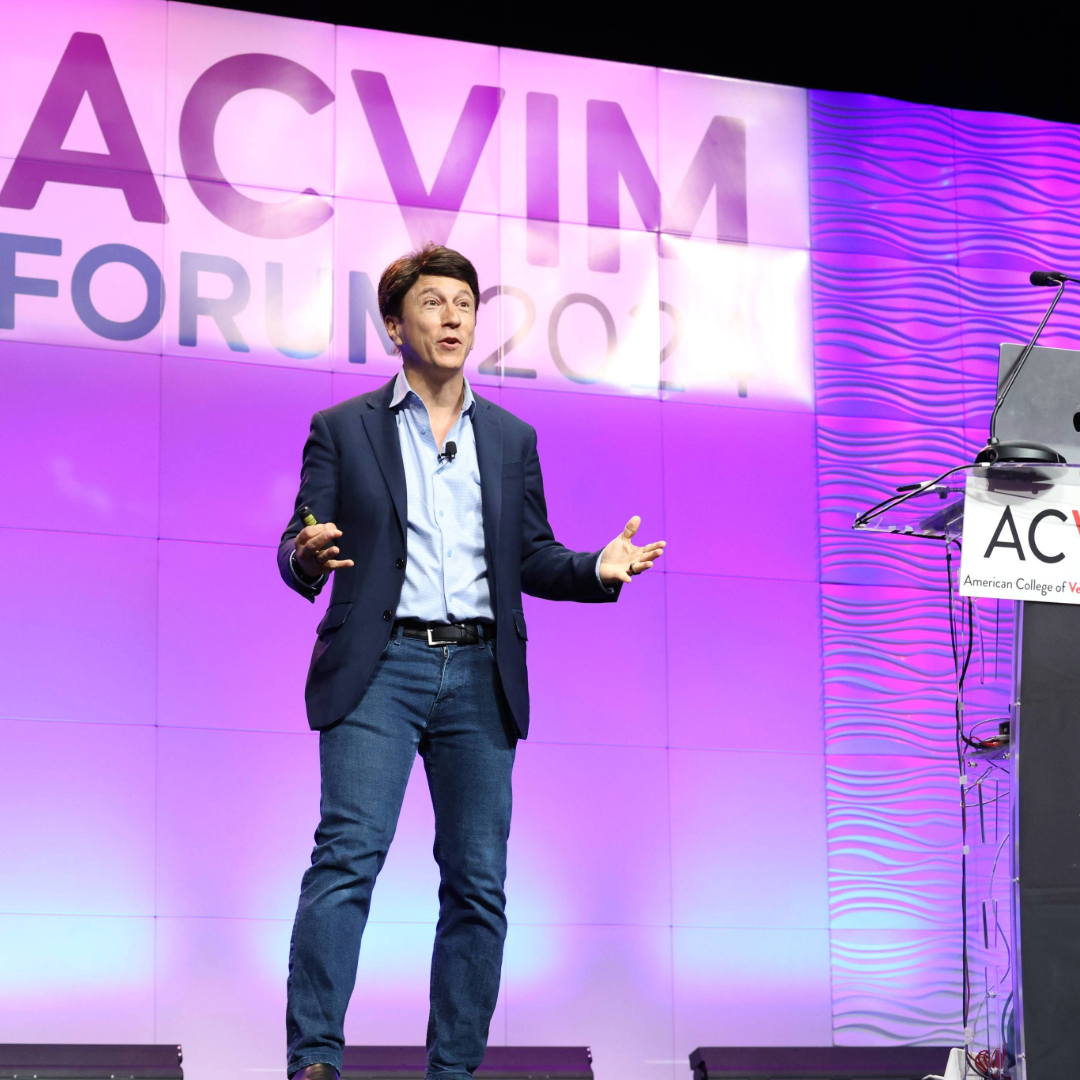 Man speaking on stage at ACVIM Forum 2024